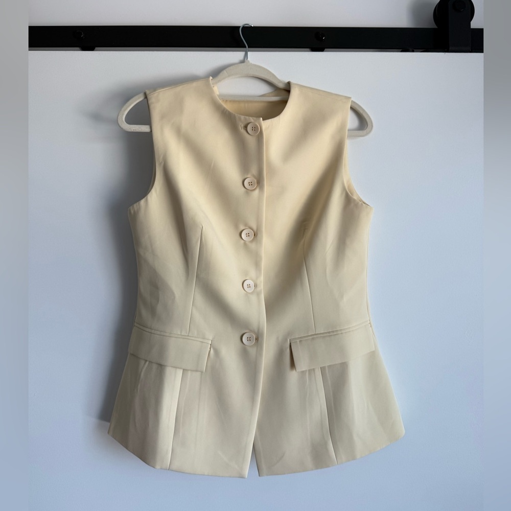Sleeveless Button-Front Vest in Cream